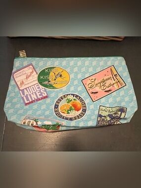 Estee Lauder Light Blue Pouch with Travel Patches